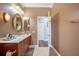 Bathroom with single vanity and access to backyard at 1217 Vista Hills Dr, Lakeland, FL 33813