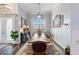 Formal dining room with wood table, chairs, and a chandelier at 1217 Vista Hills Dr, Lakeland, FL 33813