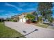 Home's side view, highlighting the garage and landscaping at 1217 Vista Hills Dr, Lakeland, FL 33813