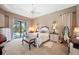 Main bedroom with pool view, and white bedroom furniture at 1217 Vista Hills Dr, Lakeland, FL 33813