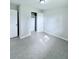 Bedroom with tile floors and a large closet at 122 8Th Se St, Fort Meade, FL 33841