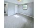 Bedroom with tile floors, closet and window at 122 8Th Se St, Fort Meade, FL 33841