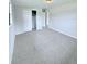 Bedroom with tile floors, closet, and window at 122 8Th Se St, Fort Meade, FL 33841