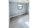 Bright bedroom with tile floors and a window at 122 8Th Se St, Fort Meade, FL 33841