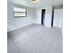 Bright bedroom with tile floors and window at 122 8Th Se St, Fort Meade, FL 33841