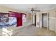 Bedroom with wood paneling, carpet and closet at 127 Colonial Dr, Auburndale, FL 33823