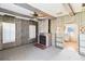 Living room with fireplace and built in shelving at 127 Colonial Dr, Auburndale, FL 33823