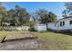 Backyard with storage shed, raised garden bed, and above ground pool at 1317 W Belmar St, Lakeland, FL 33815