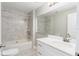 Clean bathroom with bathtub, shower, and vanity at 1317 W Belmar St, Lakeland, FL 33815