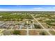 Aerial view of a residential neighborhood with many houses at 1405 Kissimmee Dr, Kissimmee, FL 34759