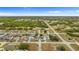 Aerial view showing a house's location in a residential area at 1405 Kissimmee Dr, Kissimmee, FL 34759