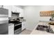 Modern kitchen with stainless steel appliances at 1405 Kissimmee Dr, Kissimmee, FL 34759