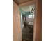 Bathroom with teal walls, shower/tub combo, and sink at 1408 28Th Nw St, Winter Haven, FL 33881