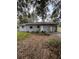 Ranch-style home with mature trees at 1408 28Th Nw St, Winter Haven, FL 33881