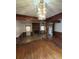 Living room with hardwood floors and fireplace at 1408 28Th Nw St, Winter Haven, FL 33881