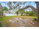 Peaceful backyard with a stone patio and water feature at 1423 Royal Forest Loop, Lakeland, FL 33811