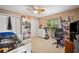 Bedroom with twin bed, bookcase, and desk at 1423 Royal Forest Loop, Lakeland, FL 33811