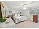 Spacious bedroom with a queen-size bed and dresser at 1521 Leighton Ave, Lakeland, FL 33803