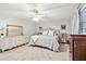 Bright bedroom with a queen bed and plenty of light at 1521 Leighton Ave, Lakeland, FL 33803