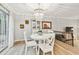 Bright dining area with white table and chairs, and chandelier at 1521 Leighton Ave, Lakeland, FL 33803