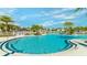 Large, inviting community pool with ample deck space at 1559 Carey Palm Cir, Kissimmee, FL 34747