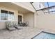 Relaxing patio area with lounge chairs and a small pool at 1559 Carey Palm Cir, Kissimmee, FL 34747