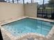 Small private pool with surrounding brick pavers at 1559 Carey Palm Cir, Kissimmee, FL 34747