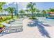 Plenty of lounge chairs around the refreshing pool at 1559 Carey Palm Cir, Kissimmee, FL 34747