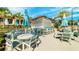 Relaxing poolside bar with tables and umbrellas at 1559 Carey Palm Cir, Kissimmee, FL 34747