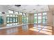 Bright yoga studio with mirrors and hardwood floors at 1559 Carey Palm Cir, Kissimmee, FL 34747