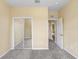 Well-lit bedroom with mirrored closet doors at 16202 Indian Creek Dr # 16202, Kissimmee, FL 34759