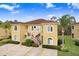 Two-story building with red tile roof and stairs at 16202 Indian Creek Dr # 16202, Kissimmee, FL 34759