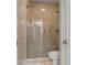 Modern bathroom with a glass shower enclosure and updated fixtures at 1665 Blue Heron Ln, Lakeland, FL 33813