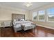 Spacious bedroom with hardwood floors and large windows at 1665 Blue Heron Ln, Lakeland, FL 33813