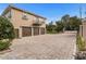 Brick paved driveway leading to a 4 car garage at 1665 Blue Heron Ln, Lakeland, FL 33813