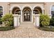 Elegant entryway with arched doorways and columns at 1665 Blue Heron Ln, Lakeland, FL 33813