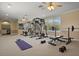 Home gym featuring multiple pieces of workout equipment at 1665 Blue Heron Ln, Lakeland, FL 33813