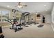 Spacious home gym with various equipment and plenty of floor space at 1665 Blue Heron Ln, Lakeland, FL 33813