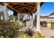 Outdoor kitchen and seating area under covered patio at 1665 Blue Heron Ln, Lakeland, FL 33813