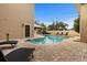 Luxury pool with lounge chairs, and a spacious patio at 1665 Blue Heron Ln, Lakeland, FL 33813