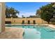 Relaxing kidney-shaped pool with spa and ample deck space at 1665 Blue Heron Ln, Lakeland, FL 33813