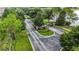 Aerial view of community entrance and road at 178 Magneta Loop, Auburndale, FL 33823