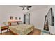 Main bedroom with large bed and TV at 178 Magneta Loop, Auburndale, FL 33823