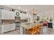 Well-equipped kitchen with ample counter space and white cabinetry at 178 Magneta Loop, Auburndale, FL 33823