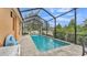 Relaxing screened pool and patio area at 178 Magneta Loop, Auburndale, FL 33823