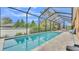 Refreshing screened pool and patio area at 178 Magneta Loop, Auburndale, FL 33823