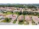 Aerial view of a suburban neighborhood with houses and green spaces at 1832 Prima Vista Dr, Lakeland, FL 33810