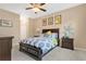 Bright bedroom with double bed, nightstand and closet at 1832 Prima Vista Dr, Lakeland, FL 33810