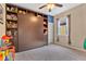 Bedroom with built-in wall bed and shelving at 1832 Prima Vista Dr, Lakeland, FL 33810