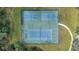 Aerial view of tennis and basketball courts at 1832 Prima Vista Dr, Lakeland, FL 33810